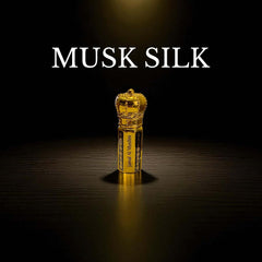 Musk Silk attar bottle with elegant design, showcasing the luxurious fragrance in a gold-colored bottle.