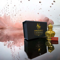 Cool Aura for Her - Refreshing Women's Perfume Oil by Jamal Al Muslim in elegant packaging with a golden bottle.