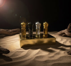 Mega Deal Musk Discovery Box featuring four premium Musk oils elegantly displayed on a golden tray.
