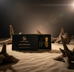 Mega Deal Musk Discovery Box featuring elegant packaging and 4 premium Musk oils on a sandy background.