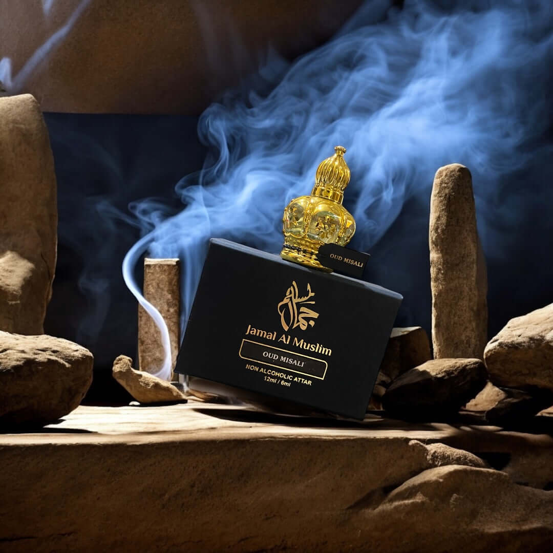 Elegant Oud Misali attar in a golden crown bottle with smoky backdrop and premium packaging.