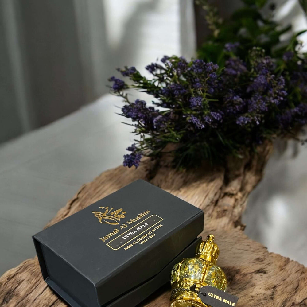 Ultra Male Perfume Oil bottle and box with flowers, showcasing bold fragrance for confident men.