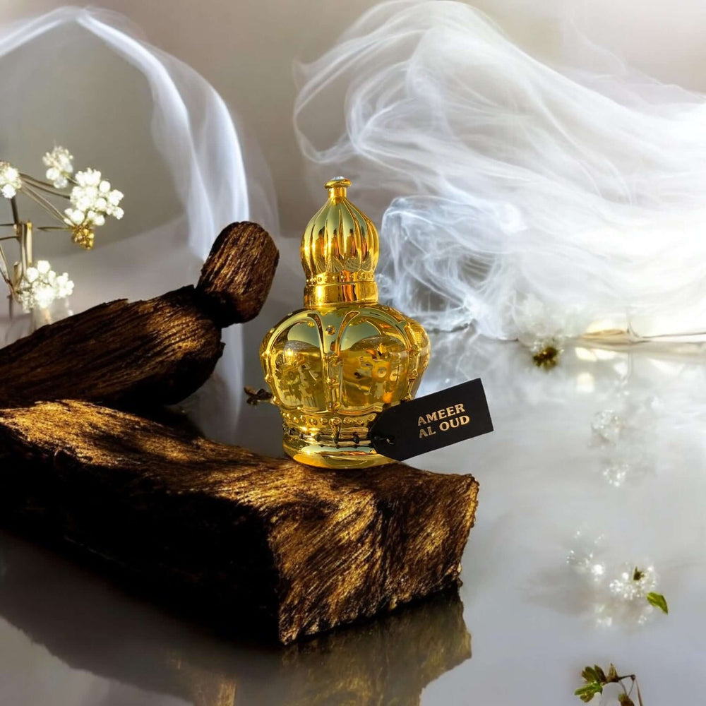 Ameer Al Oud fragrance bottle on wooden surface with soft smoke background, showcasing its luxurious design.