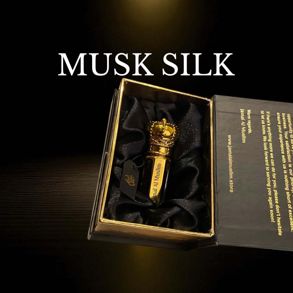 Musk Silk attar bottle displayed in a luxurious box with black satin lining.