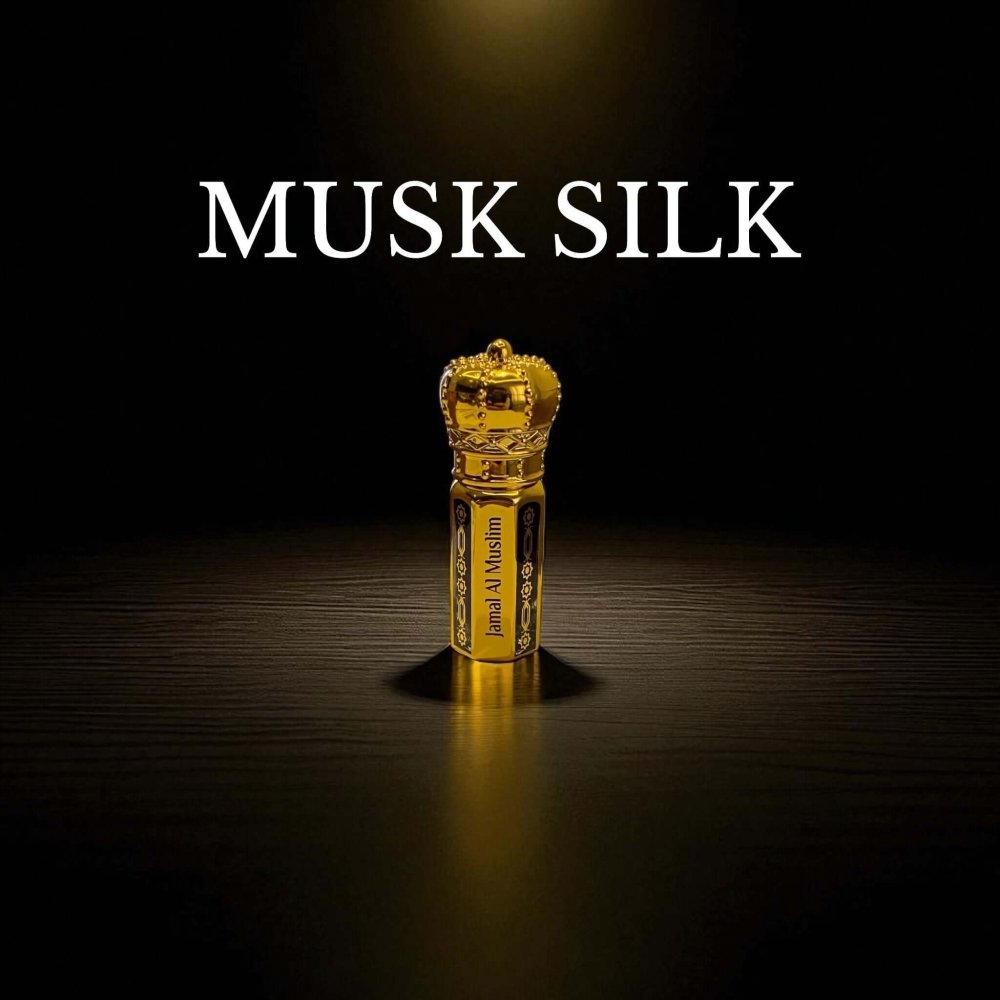 Musk Silk attar bottle with elegant design, showcasing the luxurious fragrance in a gold-colored bottle.
