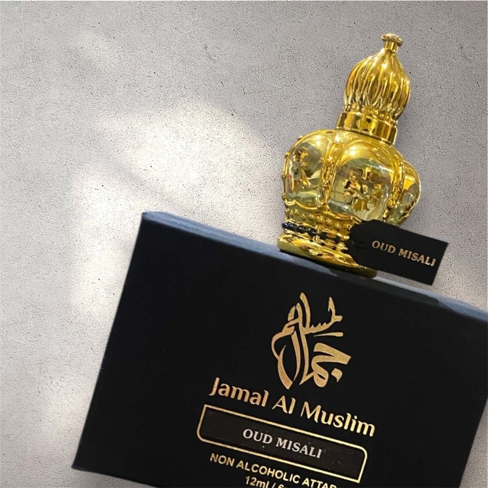 Jamal Al Muslim Oud Misali attar in a luxurious gold bottle with black box, non-alcoholic perfume, 12ml.